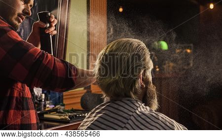 Hipster Client Getting Haircut. Do Not Cut Your Own Hair. Barber Works On Hairstyle For Bearded Man 