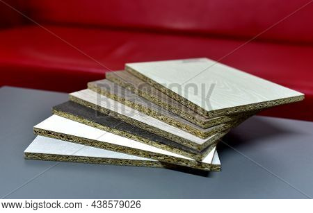 Samples Of Fibreboard Panels With Wood Texture. Laminated Cpd. Chipboard Pvc Edge. Wooden Furniture