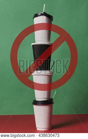 Stop Using Single-use Plastic. A Pile Of Plastic Coffee Cups With Forbidden Sign.