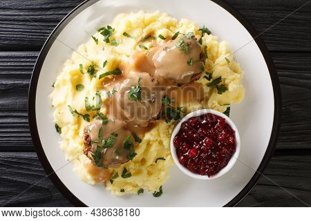 Scandinavian Meatball Lihapullat With Mashed Potatoes And Lingonberry Jam Close-up In A Plate On The