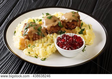 Scandinavian Meatball Lihapullat With Mashed Potatoes And Lingonberry Jam Close-up In A Plate On The