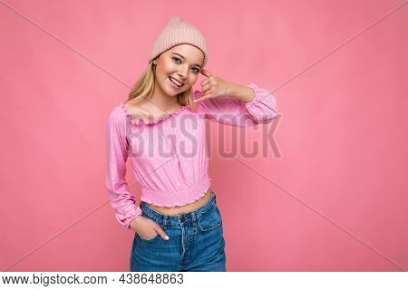Photo Of Beautiful Happy Smiling Young Blonde Woman Isolated Over Pink Background Wall Wearing Trend