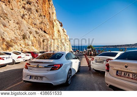 Kas, Turkey - 08. 25. 2021: White Opel Insignia At The Street Of Touristic City Kaputas Near Kas, Tu