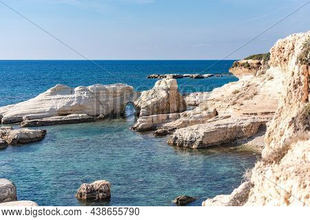Rocks In The Sea Off The Coast Of Cyprus. Warm Sea And Picturesque Coastal Views In November.