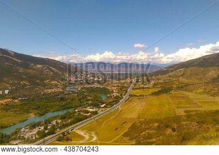 View From A Height Of The Mountains And A Small Town. Photo From The Drone.