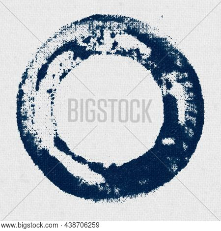 Circle stamped on white fabric