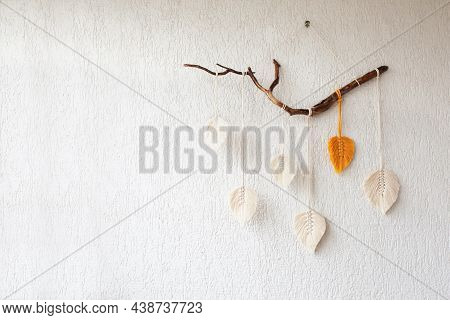 Macrame Leaves Wall Hanging In Yellow, White And Green  And Natural Color On The Wooden Stick. Cotto