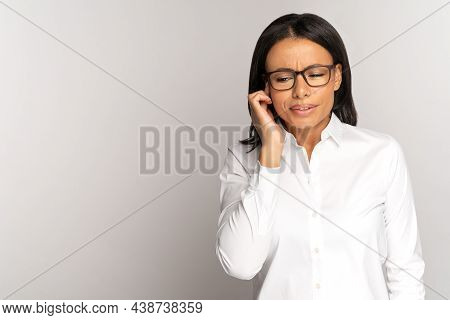 Unhealthy Woman Touching Painful Ear Suffer From Tinnitus Disease And Strong Sudden Earache. Stresse