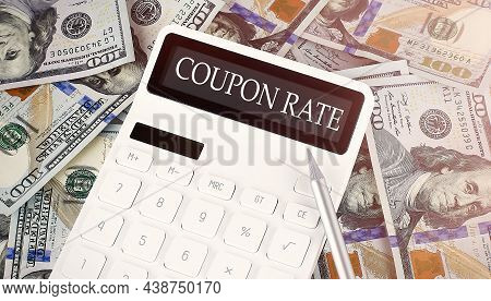 Coupon Rate Text On The Display Calculator On Dollars Background
