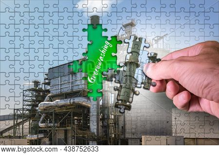 Hand Removing The Pieces Of A Puzzle That Correspond To A Smoky Chimney