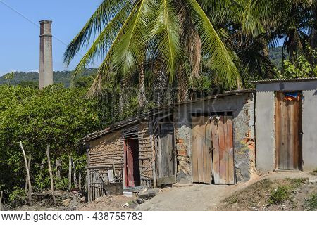 Houses Made Of Clay And Cement On The Banks Of The Grand Paraguacu River.