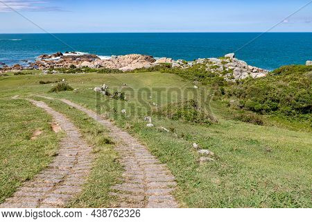 Trail Over The Cliffs With Beach In Background