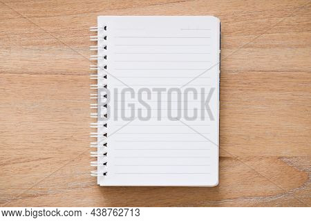 Blank Spiral Bound Notebook Journal Open On A Desk. Flat Lay Design For Journaling, School Or Messag