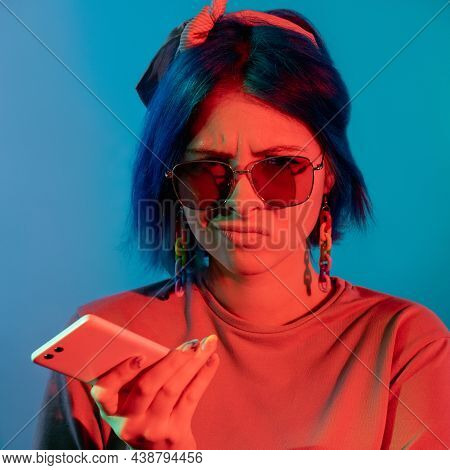 Bad Connection. Spam Message. Communication Problem. Disappointed Frustrated Woman With Phone In Red