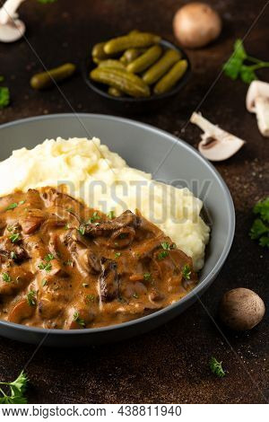Beef Stroganoff With Mushrooms And Mashed Potatoes.