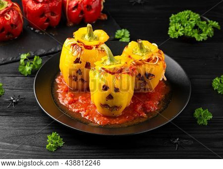 Jack O Lanterns Stuffed Yellow Pepper For Halloween.