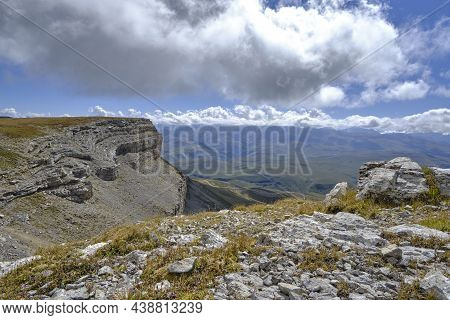 Mountain Peak Goes Into The Sky And Clouds