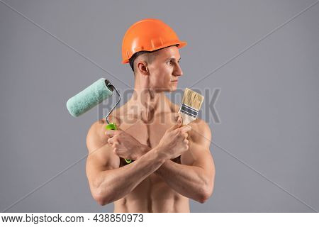 We Paint So You Dont Have To. Sexy Man Hold Paintroller And Paintbrush. Paint Work