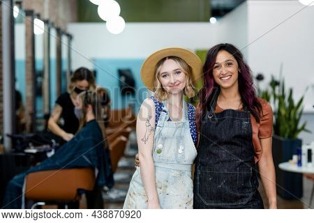 Two beauty business owners welcoming the guests