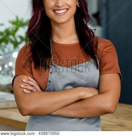 Smiling small beauty salon owner