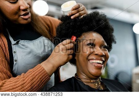 Customer getting a hairdo at a beauty salon