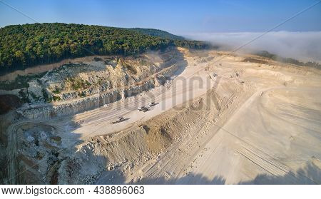 Aerial View Of Open Pit Mining Site Of Limestone Materials Extraction For Construction Industry With