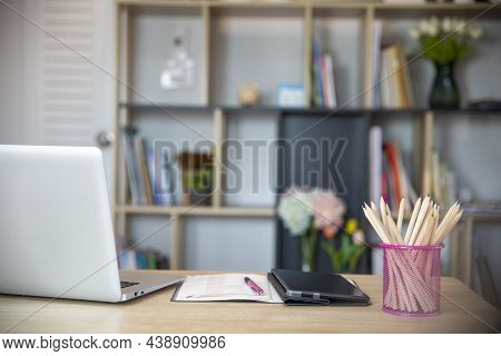 Desk For Student Concept. Laptop Computer For Study For Exam, Book Place On School Table For Student