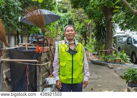 Portrait Happy Old Asian Man Street Cleaner Standing Next To An Old Gabage Cart Before Going To Work