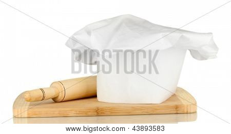Kochmütze mit Federballschläger, isolated on white