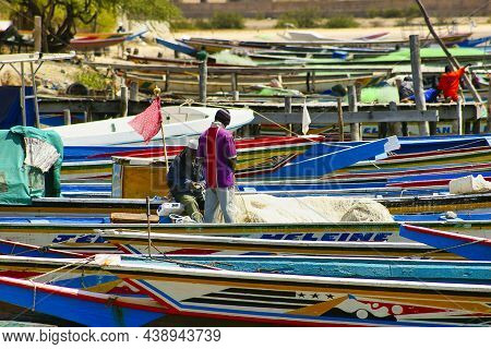 Senegal, Africa - Marsch Circa, 2016. Scene Of M'bour Great Fish Market On The Beach. People Waiting