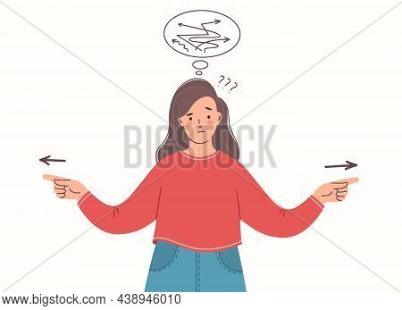 Young Woman Makes A Choice By Pointing Her Hands To The Right And To The Left. Difficult Choice Betw
