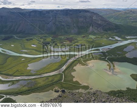 Aerial Scenic View From Skierffe Rock Summit On Glacial Rapadalen River Delta Valley At Sarek Nation