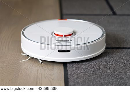 Tallinn, Estonia - October 10, 2021: Xiomi S7 Roborock Vacuum Cleaner Performs Automatic Cleaning Of