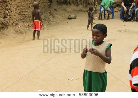 African Girl Opens The Candy.