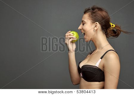 Green Apple In The Hands Of Caucasian White Girl