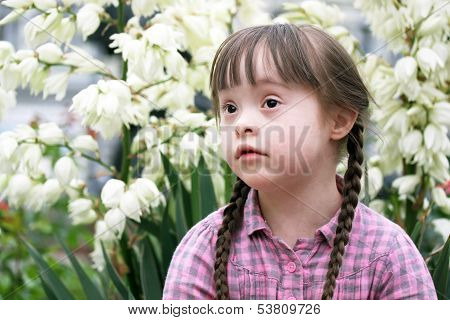 Portrait Of Beautiful Young Girl In The Park