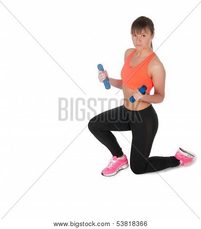 Fitness Woman Exercising With Dumpbells