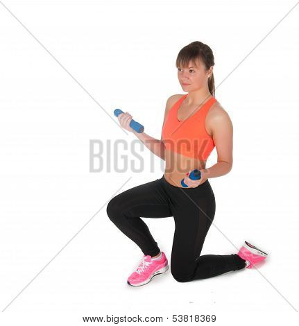 Fitness Woman Exercising With Dumpbells