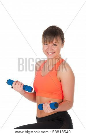 Fitness Woman Exercising With Dumpbells