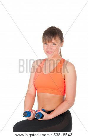 Fitness Woman Exercising With Dumpbells