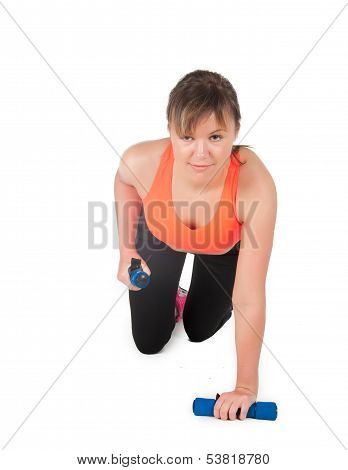 Fitness Woman Exercising With Dumpbells