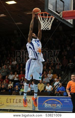 KAPOSVAR, HUNGARY ÃÂ¢Ã?Ã? OCTOBER 26: Wayne Chism (in white) in action at a Hungarian Championship basketball game with Kaposvar (white) vs. Fehervar (blue) on October 26, 2013 in Kaposvar, Hungary.