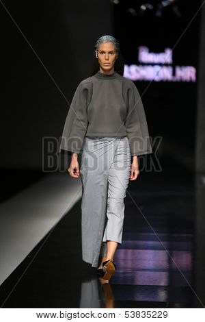 ZAGREB, CROATIA - OCTOBER 17: Fashion model wearing clothes designed by Petra Vuletic and Sasa Hortig on the 'Fashion.hr' show on October 17, 2013 in Zagreb, Croatia.