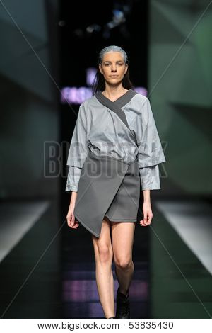 ZAGREB, CROATIA - OCTOBER 17: Fashion model wearing clothes designed by Petra Vuletic and Sasa Hortig on the 'Fashion.hr' show on October 17, 2013 in Zagreb, Croatia.
