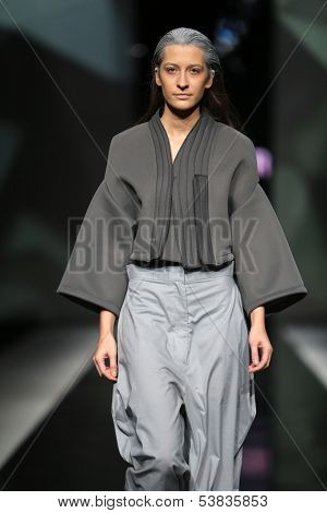 ZAGREB, CROATIA - OCTOBER 17: Fashion model wearing clothes designed by Petra Vuletic and Sasa Hortig on the 'Fashion.hr' show on October 17, 2013 in Zagreb, Croatia.