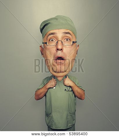 funny picture of bighead amazed doctor in glasses and uniform over grey background