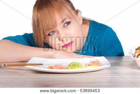 Beautiful Woman Waiting A Sushi With Chopsticks