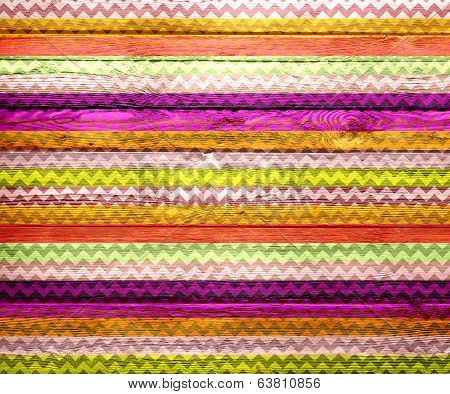 Colorful chevron pattern on wood texture