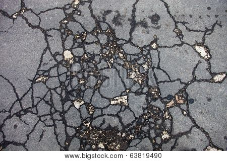 Cracked Asphalt Surface