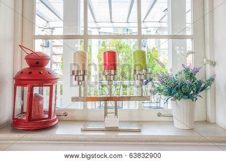 Vase With A Flower And Candle On The Windowsill Country House